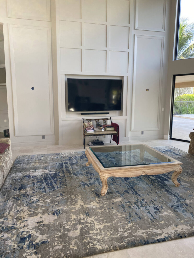 A large blue rug with modern designs