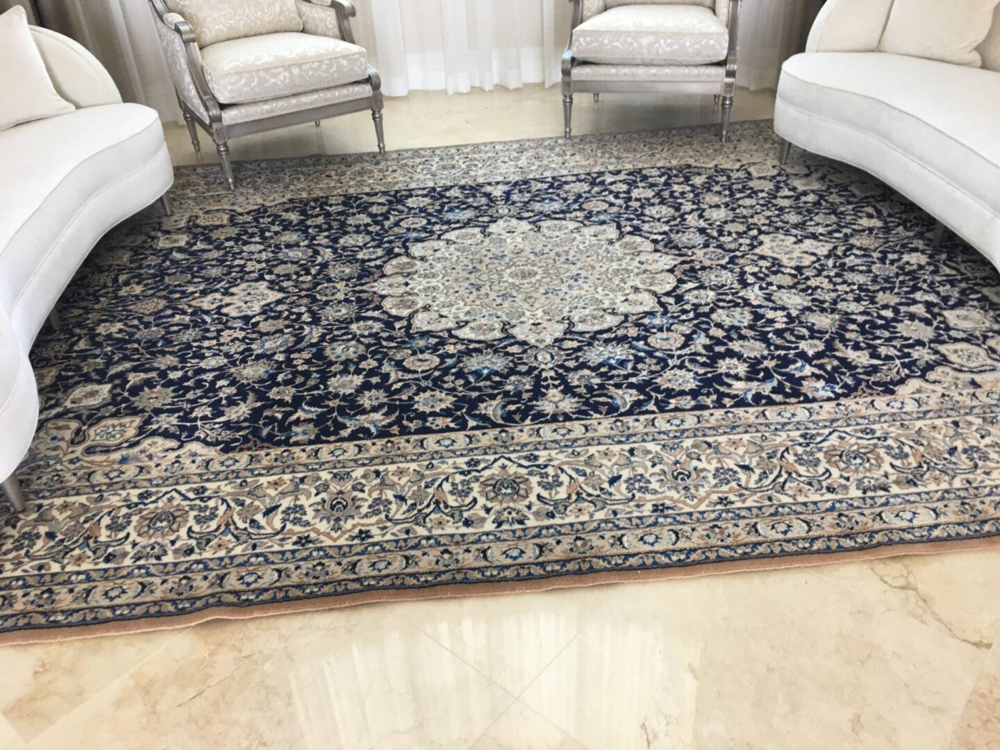 A blue carpet with mandala designs