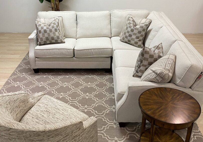 A gray rug with white patterns